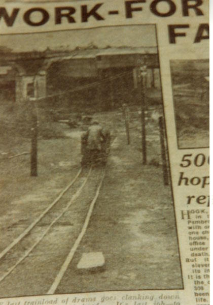 Photograph of the last drams going down the pit at Hook Colliery